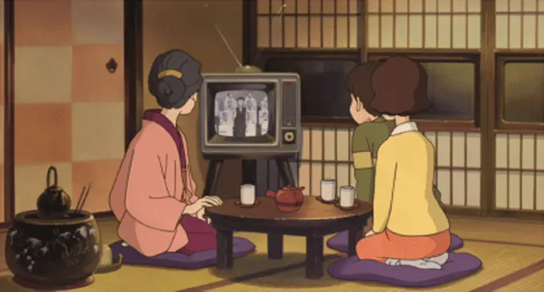 Menikmati Anime di Rumah Gambar orang menonton anime di rumah